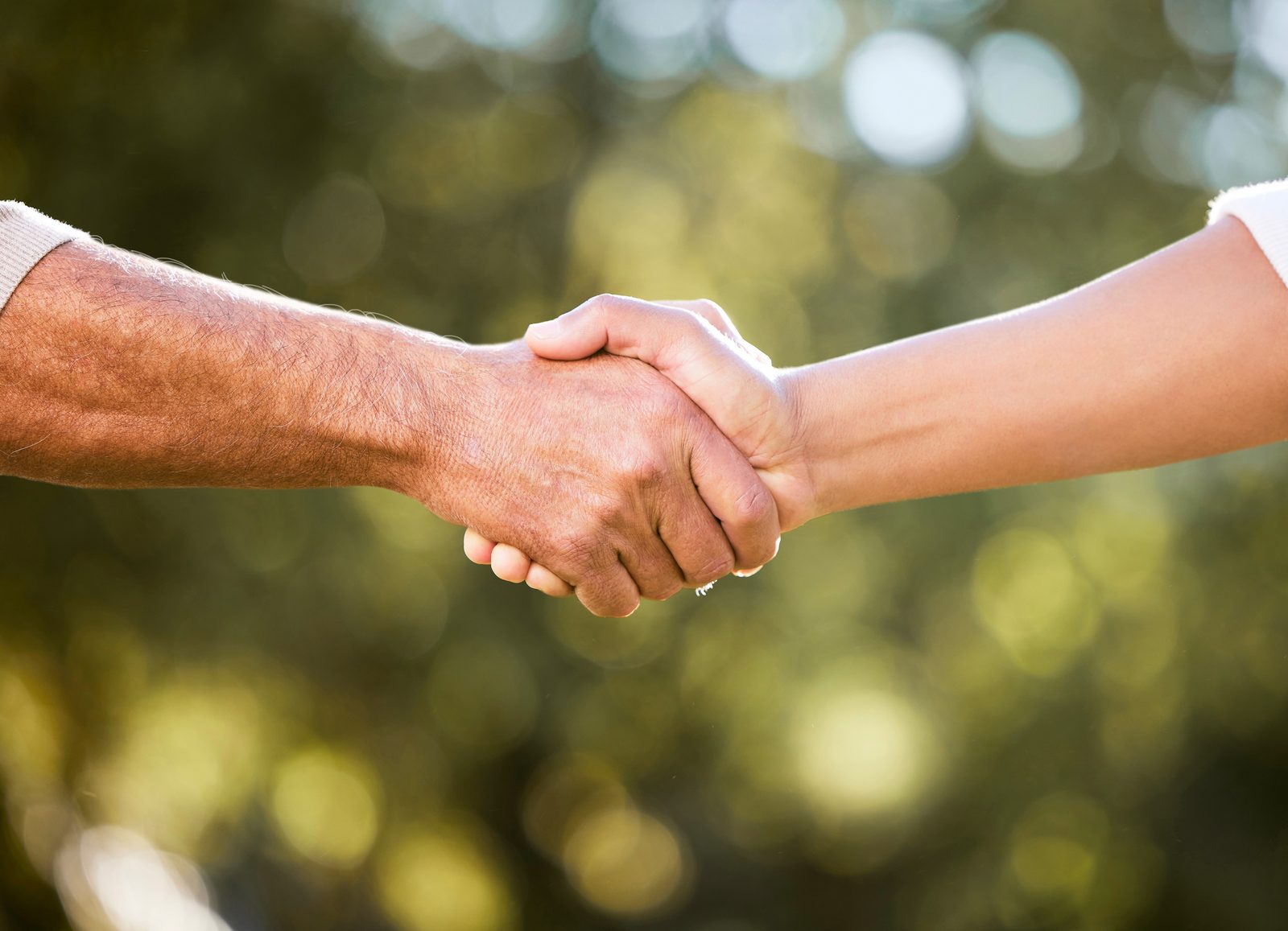 Handschlag als Zeichen der Zusammenarbeit